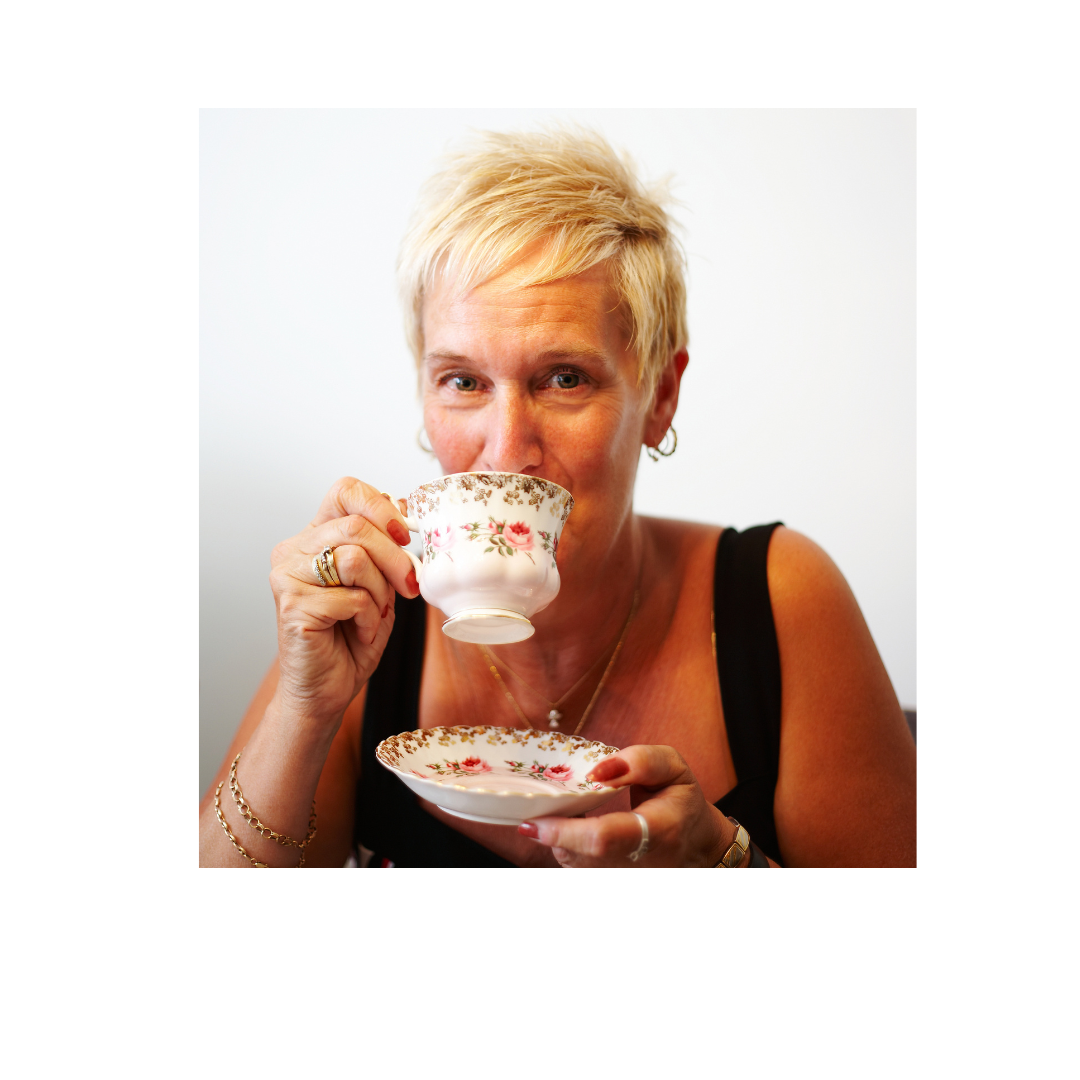older woman sipping mulberry tea