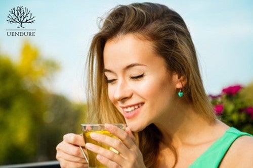 Lady sipping tea for cancer prevention