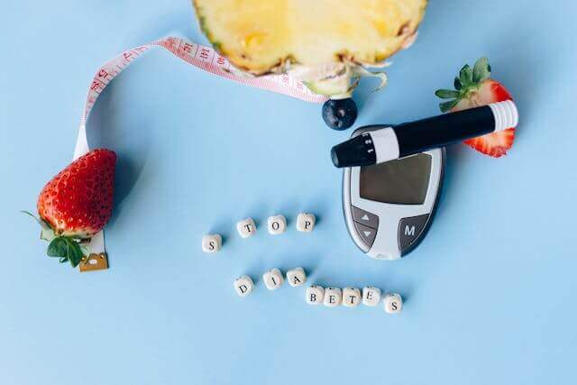 diabetes needle with strawberry and pineapple slices stop diabetes message