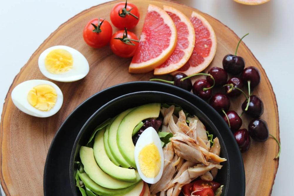 healthy plate of fruits, veggies and eggs