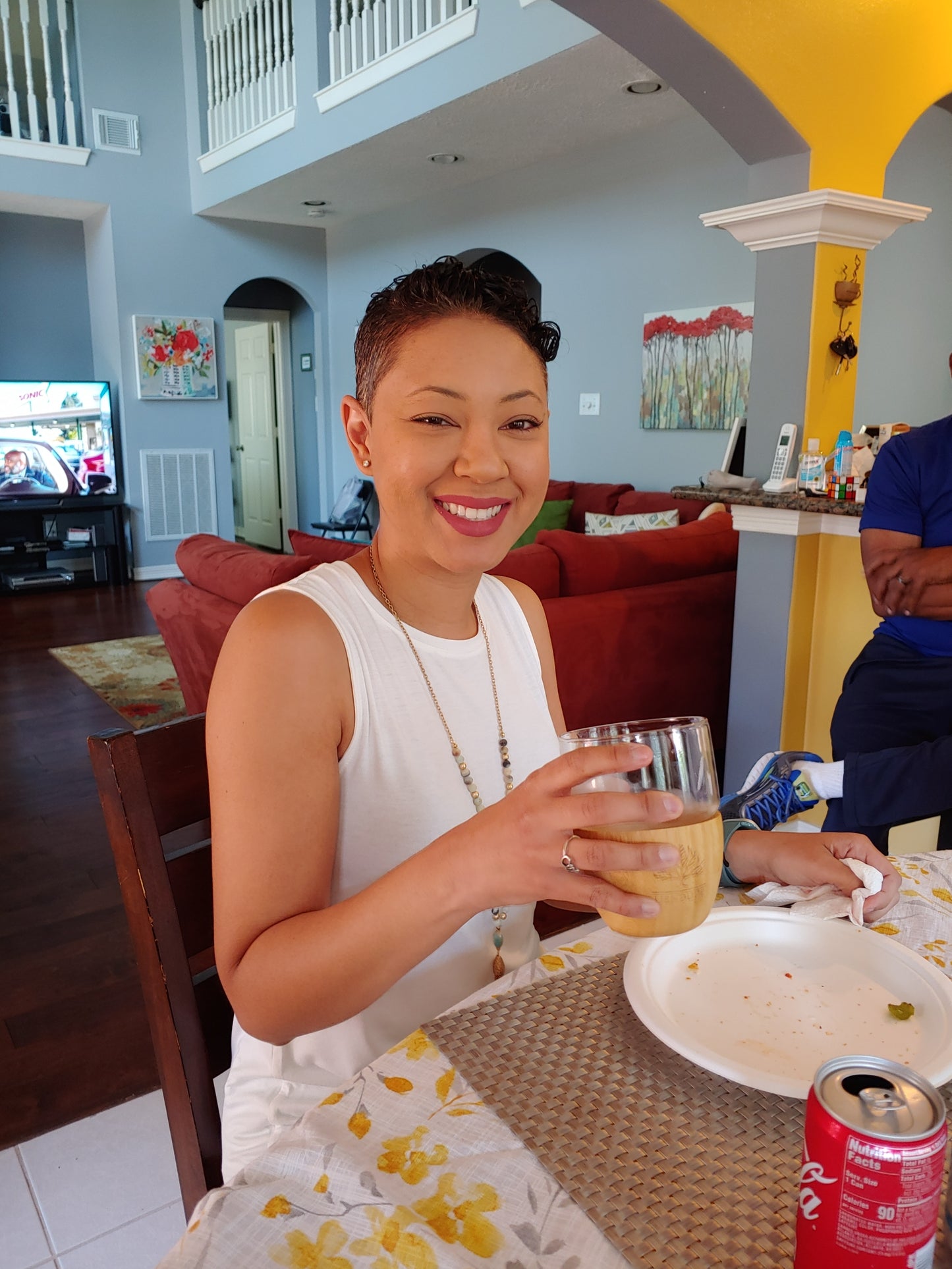 beautiful woman drinking from bamboo and glass tumbler