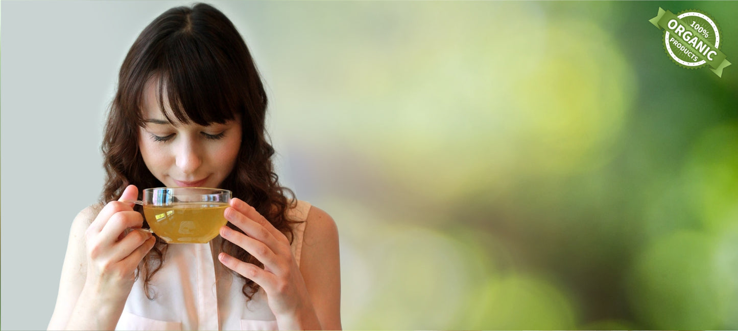 Young lady smelling the aroma of UENDURE organic tea