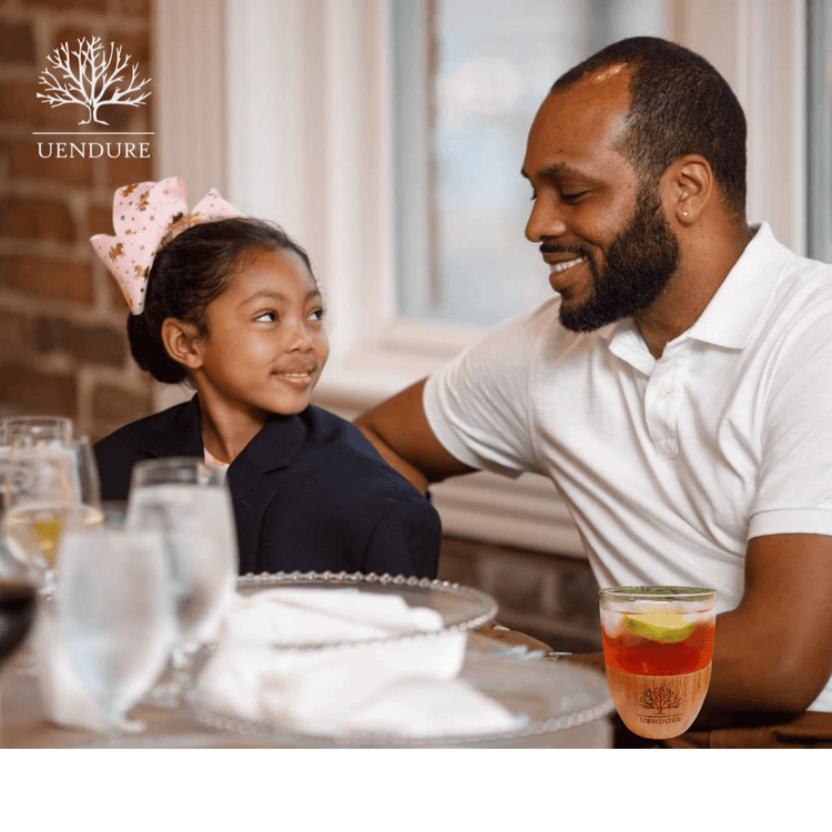 
                    
                      Dad and daughter with glass and bamboo tumber
                    
                  